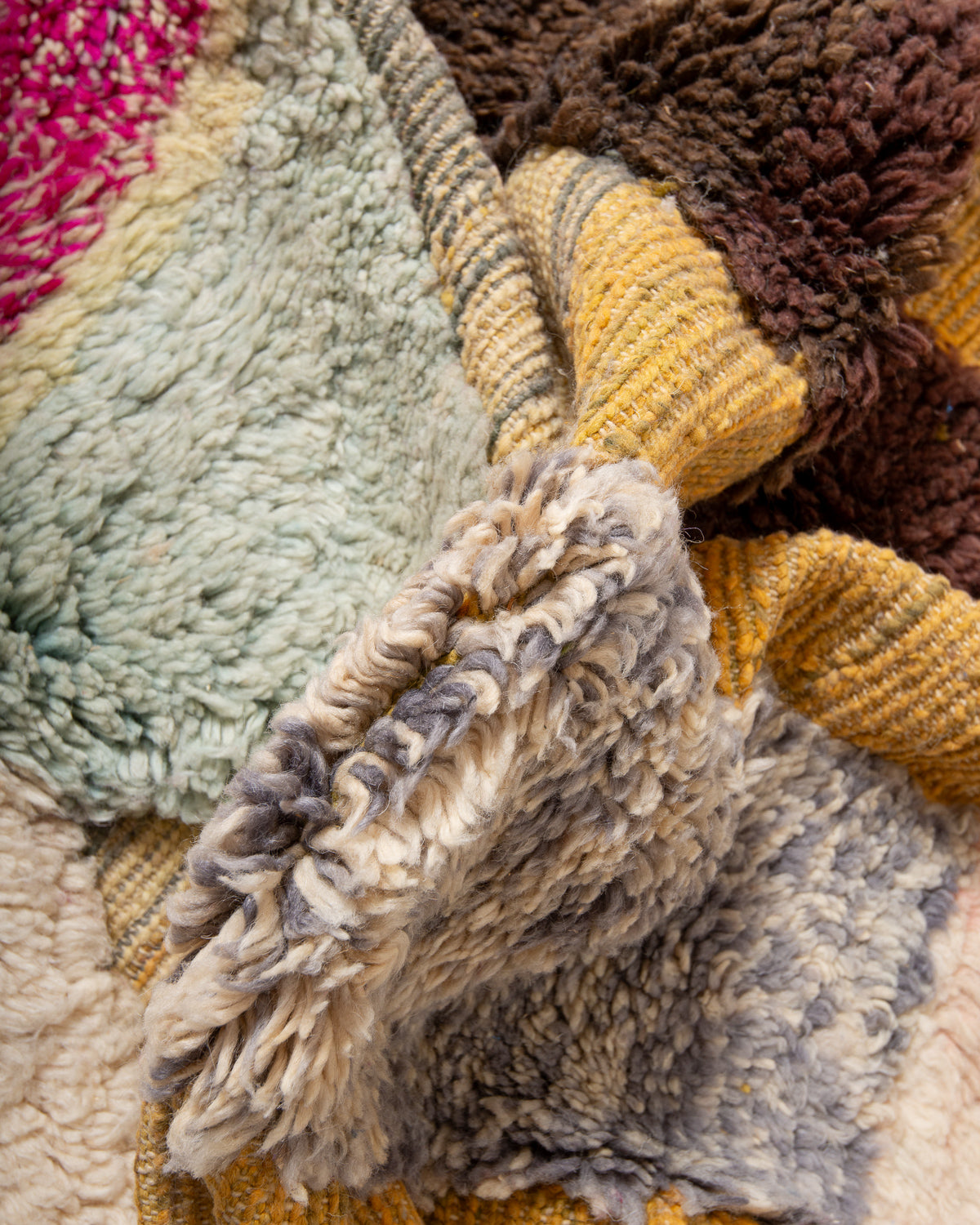 Modern, designer, handcrafted Berber rug from Morocco. Beniourain carpet with beautiful colours and patterns and fluffy wool texture.